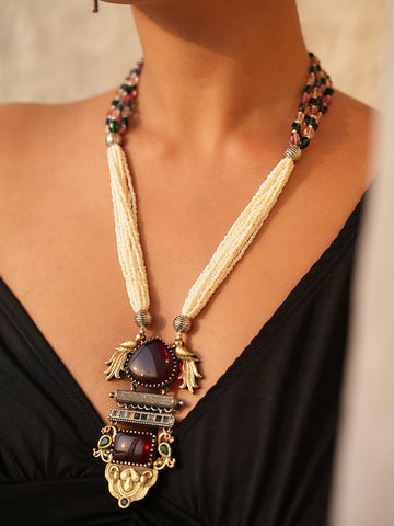 Avira Long Necklace Set With Maroon Gemstone And Peacock Pendant