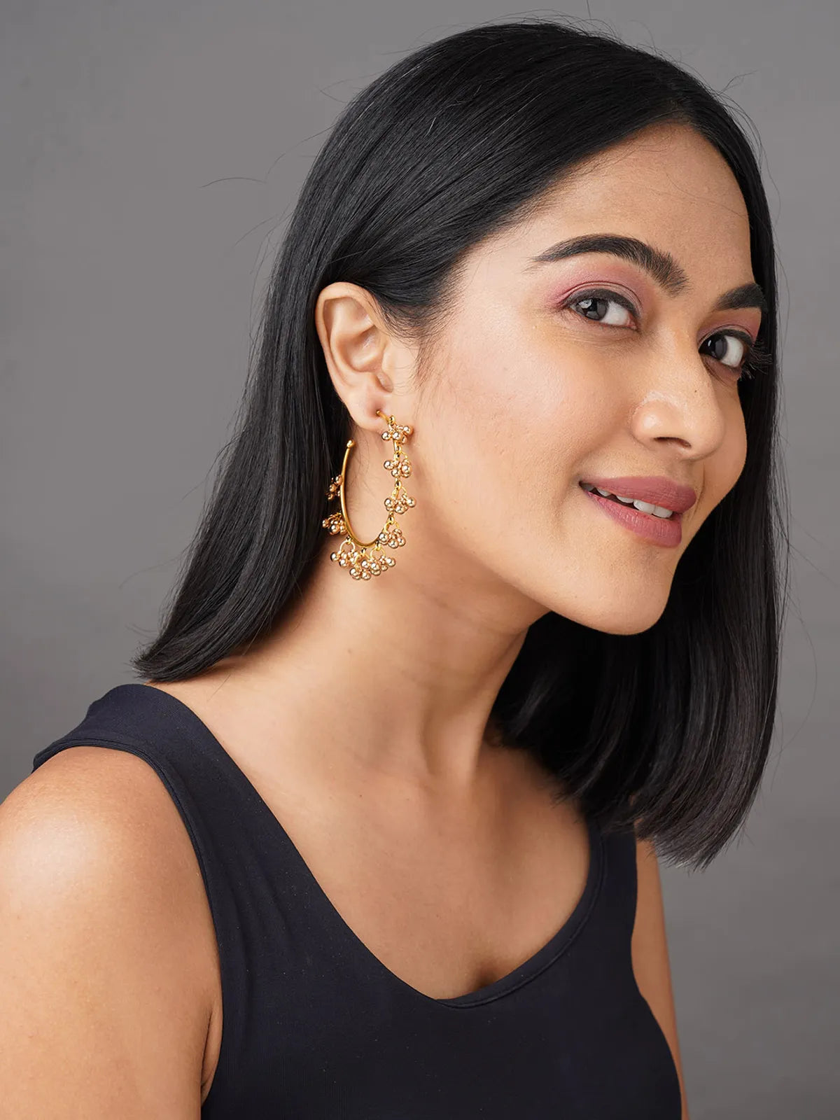 Rhea Elegant Golden Hoop Earrings With Timeless Shine