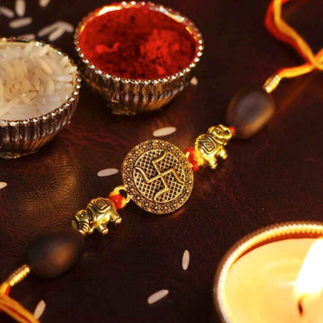 Golden Swastik Charm Rakhi