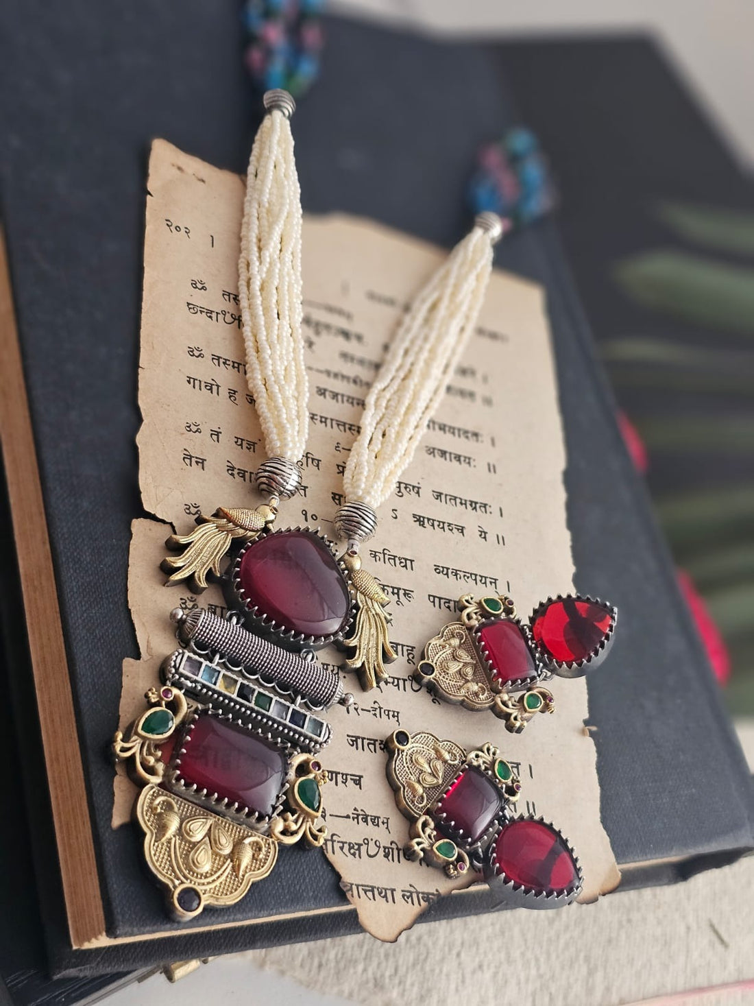 Avira Long Necklace Set With Maroon Gemstone And Peacock Pendant