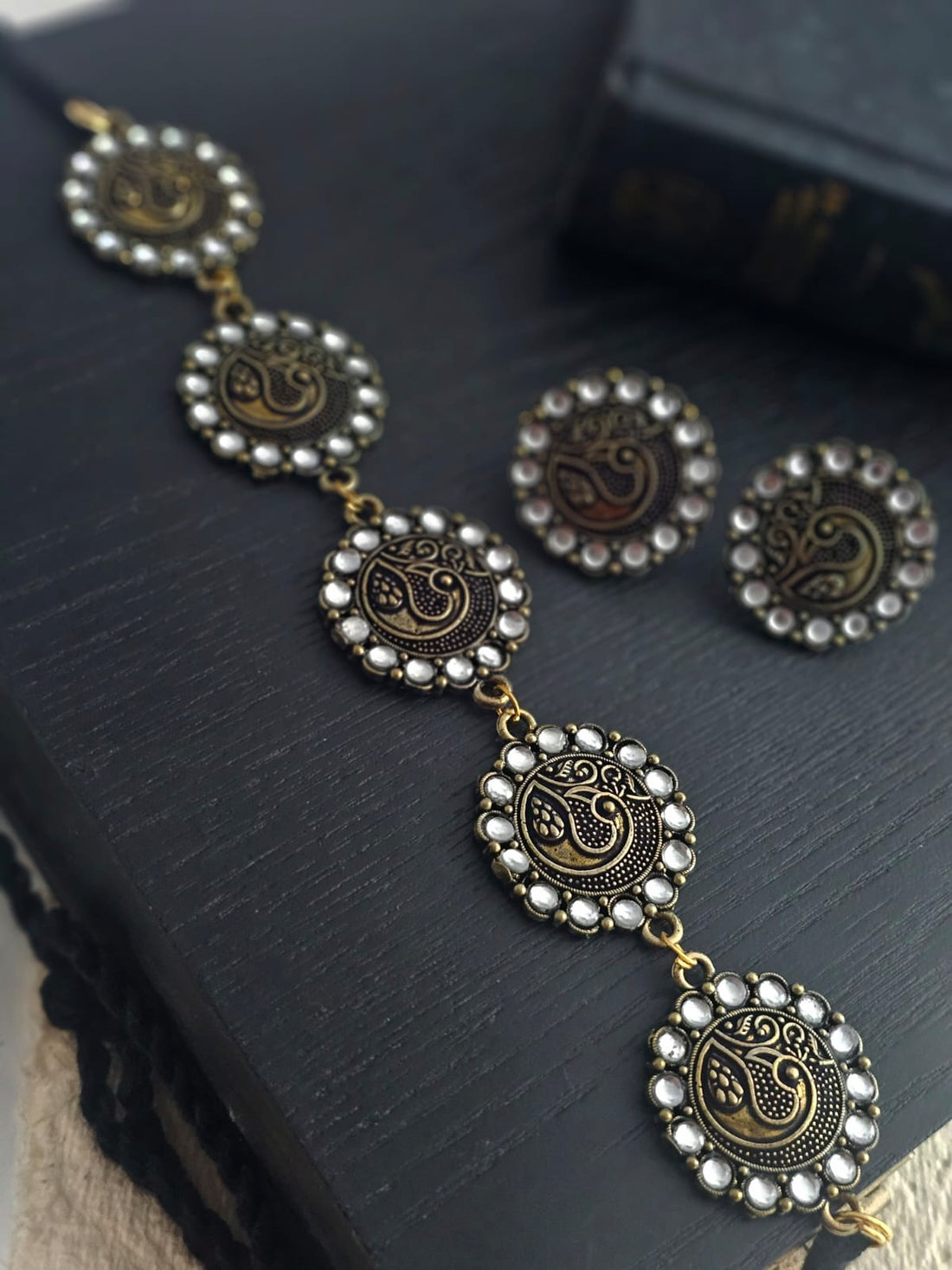 Golden choker necklace set with matching earrings