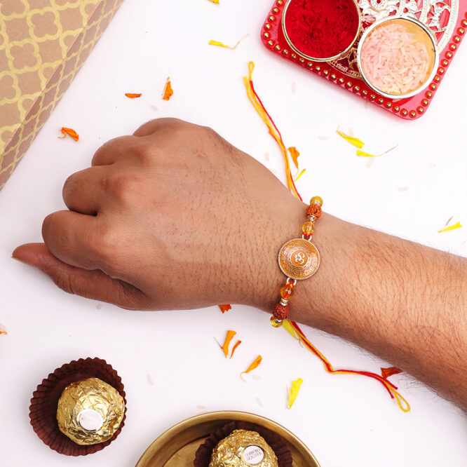 Om Round Charm Rakhi Set