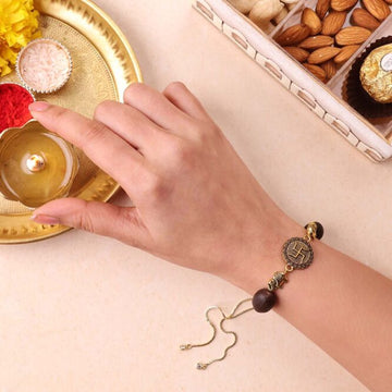 Golden Swastik Charm Rakhi