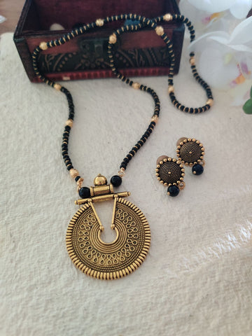 Ravina Gold-Toned Black Beaded Mangalsutra Set with Circular Pendant